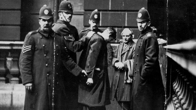 David Kirkwood and Willie Gallacher being detained by police during the 1919 Battle of George Square on 31 January 1919.