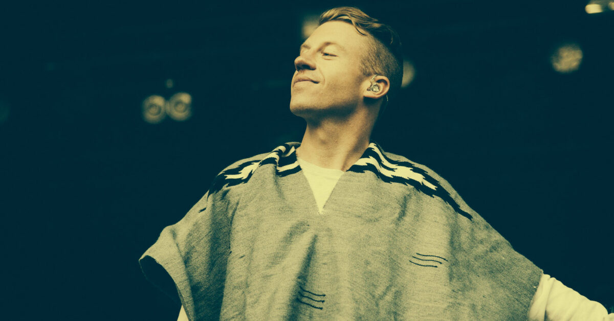 Macklemore performing on stage