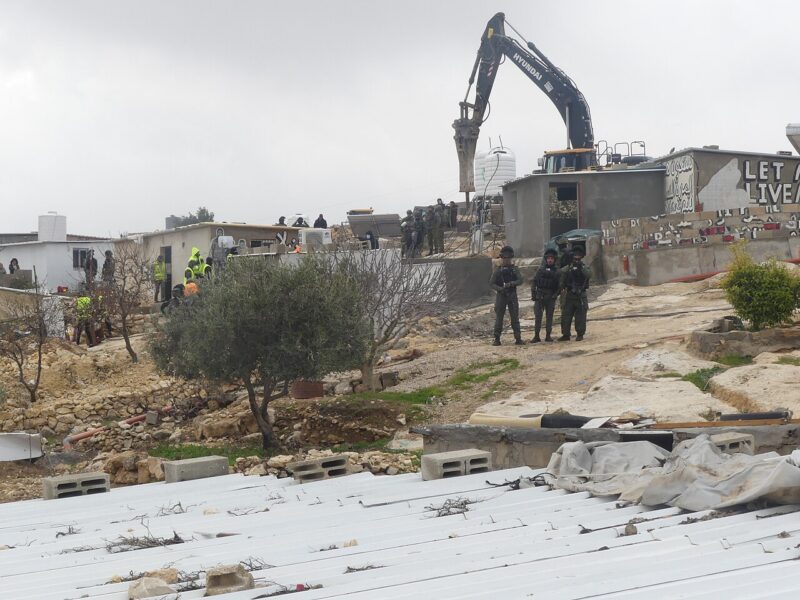 An Israeli excavator and soldiers at a Palestinian home demolition in Khallet Athaba, occupied West Bank, 10 February 2025